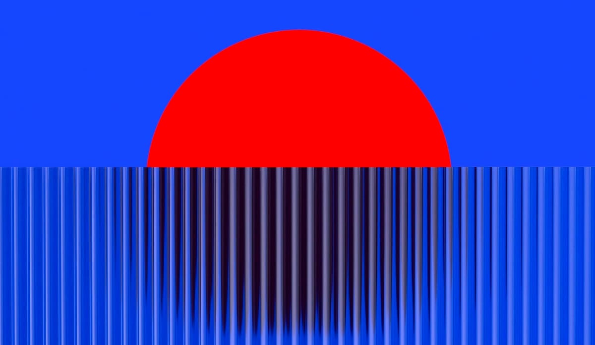 A red circle against a blue background, partially obscured by a wall of blue paper with accordion folds.