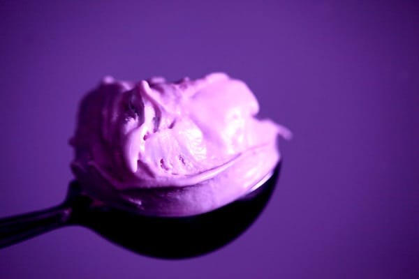 A spoonful of purple yoghurt or ice cream