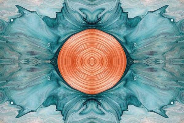 An abstract turquoise painting with a circular copper design in the center